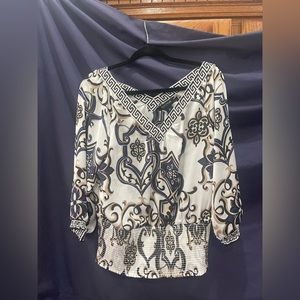 White House Black Market Blouse Silk and very sophisticated.